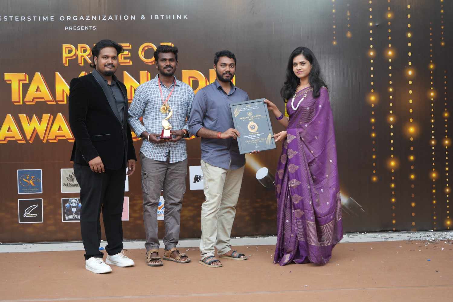 SparkLuxe receiving Pride of Tamil Nadu 2025 award